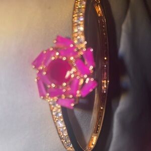 Elegant Pink and Gold toned Bracelet